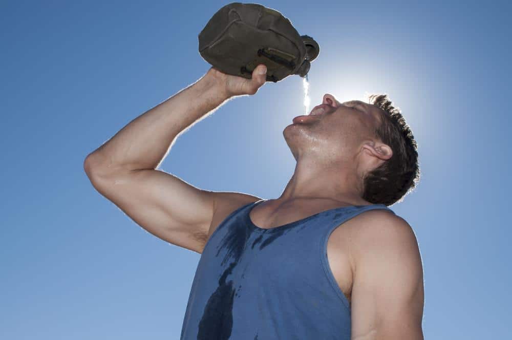 man drinking water