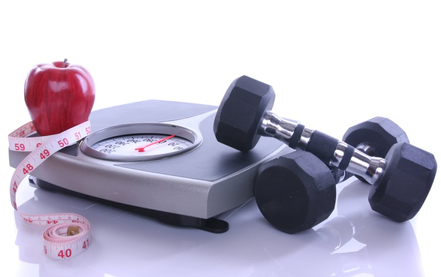 weighing scale,apple and dumbell