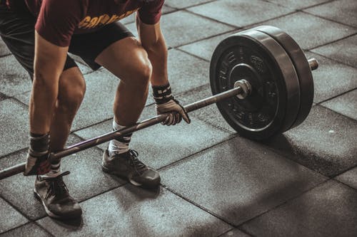 Man holding exercise equipment
